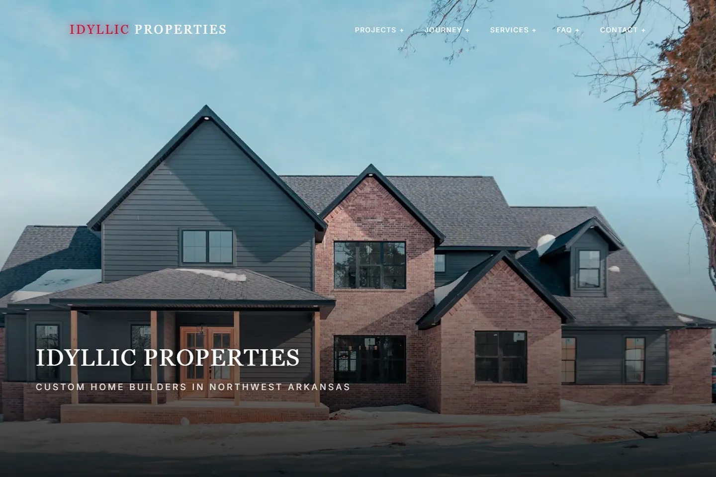 Idyllic Properties website featuring a completed custom home